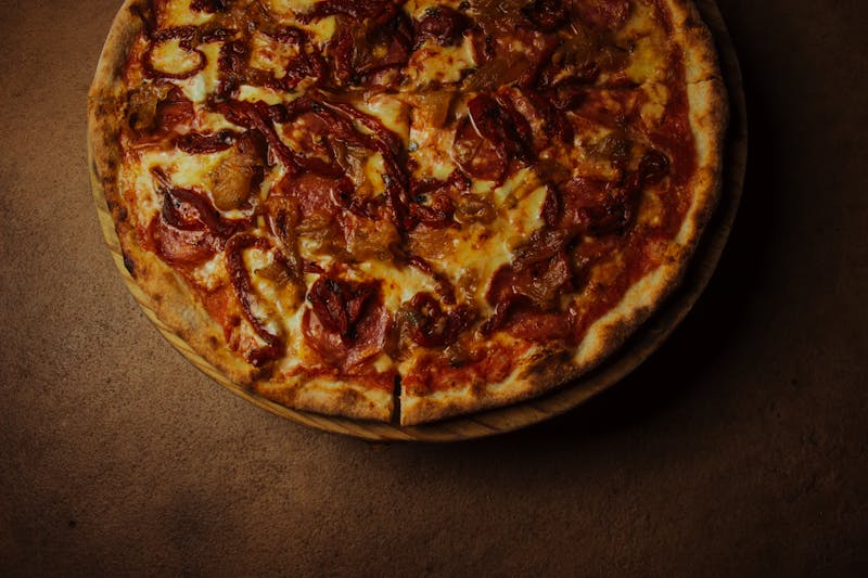 BBQ chicken pizza with red onions